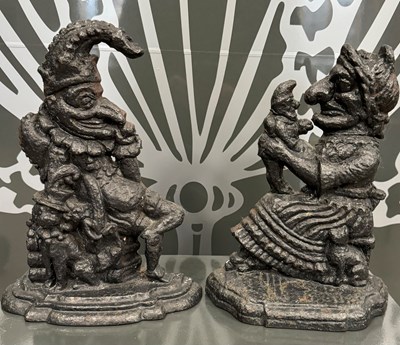 Lot 437 - Two antique cast iron doorstops in the form of...