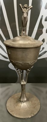 Lot 432 - An Art Nouveau style pewter chalice and cover,...