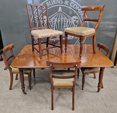 Lot 818 - A 19th century mahogany extending dining table...