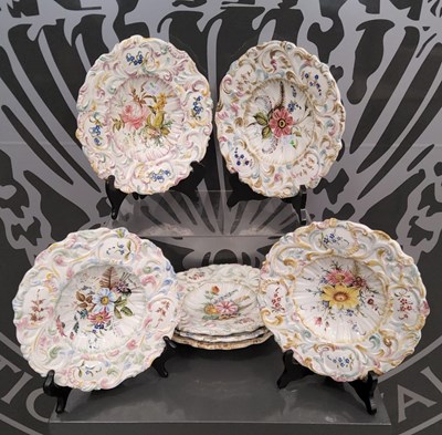 Lot 457 - A set of seven Continental pottery faience...