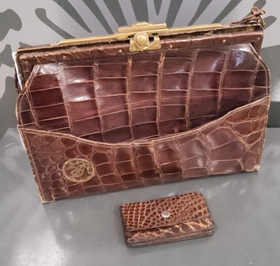 Lot 399 - A vintage faux crocodile handbag together with...