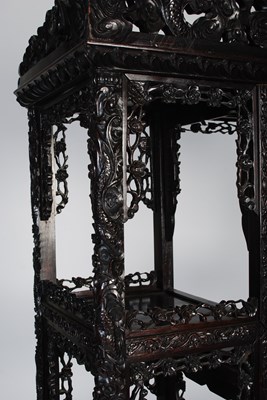 Lot 82 - A late 19th century Chinese dark wood open...