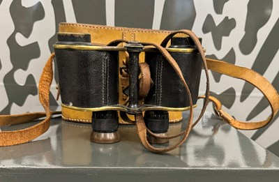 Lot 394 - A leather cased set of binoculars by W. Watson...