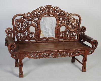 Lot 36 - A Chinese dark wood and marble high-backed...