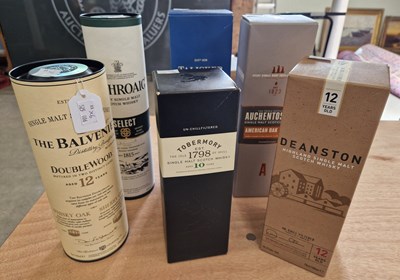 Lot 411 - A group of six boxed single malt Scotch...