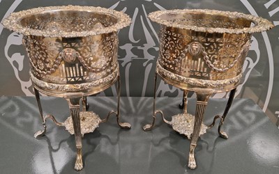 Lot 428 - A pair of antique silver-plated champagne/...