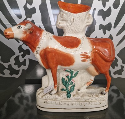 Lot 514 - Advertising interest: a Staffordshire figure...