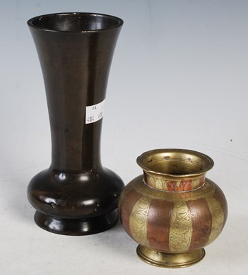 Lot 18 - An early 20th century bronze vase of tapered...