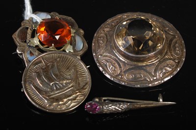 Lot 55 - A group of four assorted Scottish silver and...