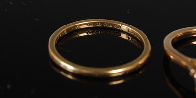Lot 65 - An 18ct gold wedding ring, size R, 2.4 grams,...