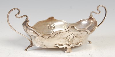 Lot 381S - An Edwardian Art Nouveau silver twin handled...