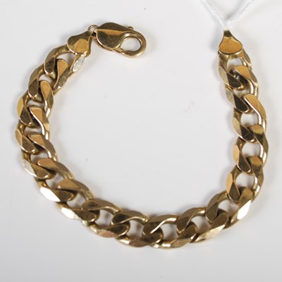 Lot 77 - A 9ct gold curb link bracelet, 21cm long, 38.8...