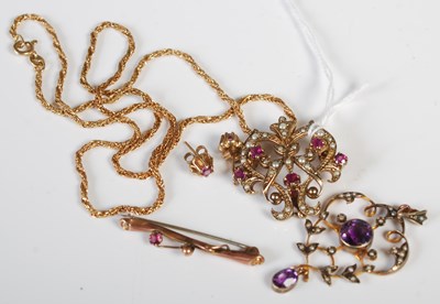 Lot 36 - A 9ct gold, split pearl and ruby set Art...