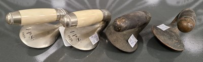 Lot 578 - A pair of curling stone handles inscribed 'I.P....