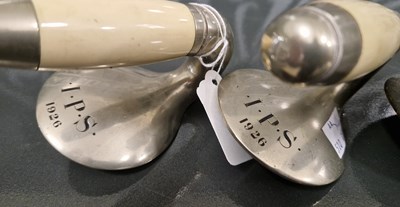 Lot 578 - A pair of curling stone handles inscribed 'I.P....