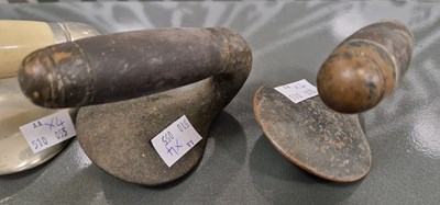 Lot 578 - A pair of curling stone handles inscribed 'I.P....