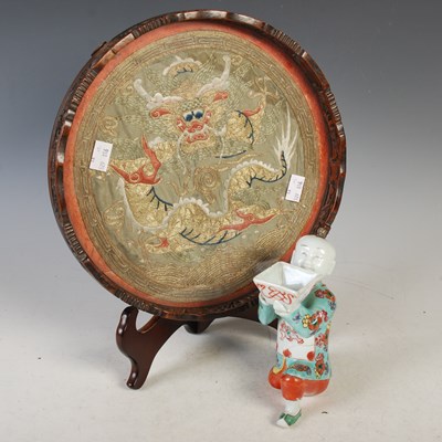 Lot 596 - A circular Chinese silk rank badge mounted as...