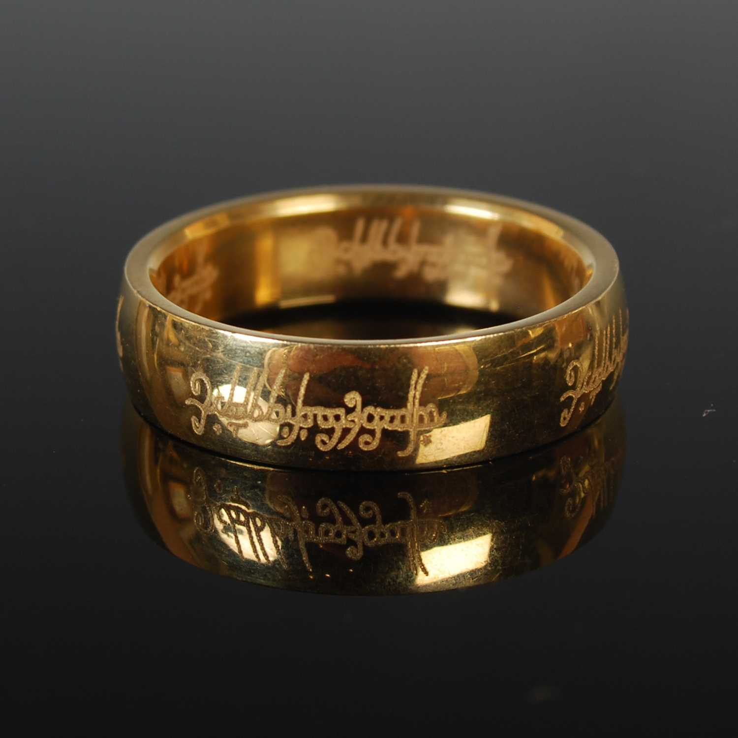 Lot 37 - Lord of the Rings interest - a yellow metal...