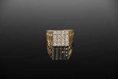 Lot 37O - A 9ct gold and diamond set dress ring, set...