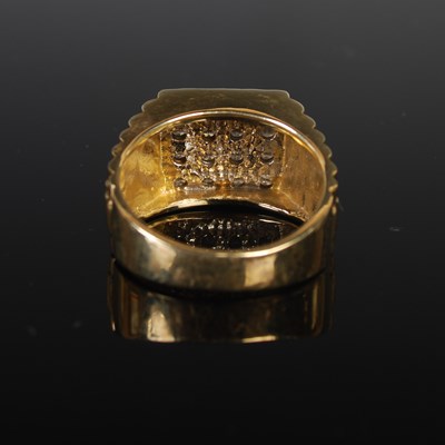 Lot 37 - A 9ct gold and diamond set dress ring, set...