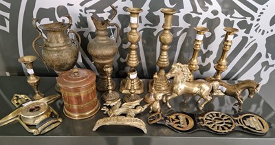 Lot 552 - A collection of assorted brassware to include...