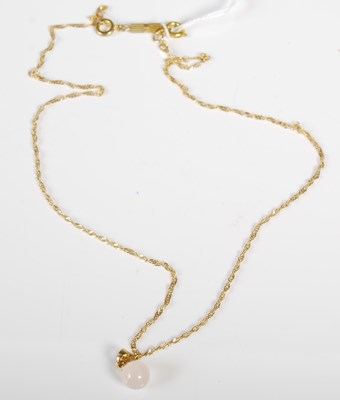 Lot 88 - A 9ct gold necklace suspending a circular...
