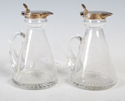 Lot 124 - A pair of early 20th century silver mounted...