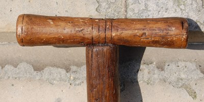 Lot 129 - An antique wooden peat spade, 109cm long