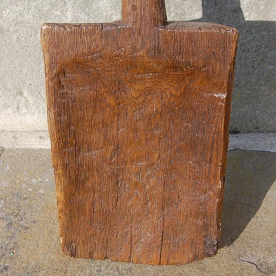 Lot 129 - An antique wooden peat spade, 109cm long