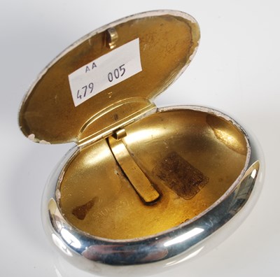Lot 129 - An Edwardian silver oval-shaped snuff box,...