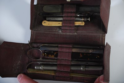 Lot 105 - A vintage leather cased manicure set, 'Evans &...