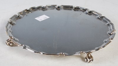 Lot 140 - An early 20th century silver salver, London...