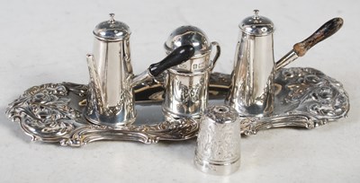 Lot 142 - A group of miniature silver wares to include a...