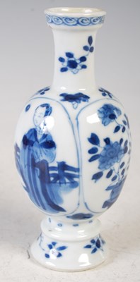 Lot 201 - A Chinese porcelain blue and white lobed vase,...