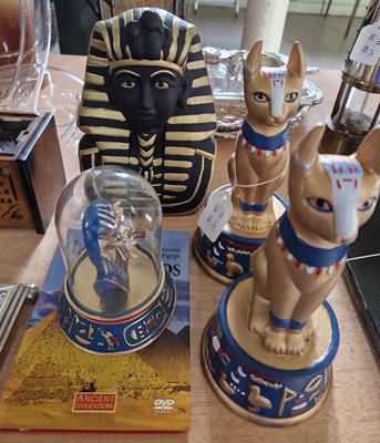 Lot 600 - A group of Egyptian themed items comprising a...