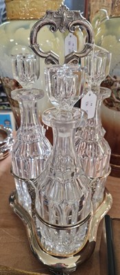 Lot 603 - A 19th century silver-plated triple decanter...