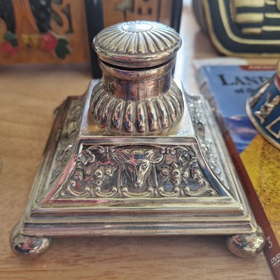 Lot 604 - A silver-plated inkwell with embossed details...