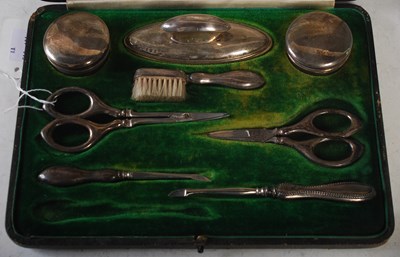 Lot 174 - A Birmingham silver eight-piece manicure set...