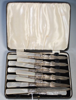 Lot 189 - A set of six mother-of-pearl handled, silver...