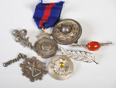 Lot 247 - A collection of silver and white metal...