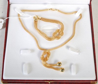 Lot 249 - A suite of 18ct gold jewellery comprising a...