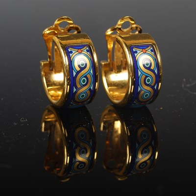 Lot 64 - A pair of yellow metal and enamel decorated...