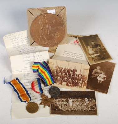 Lot 299 - A Great War group of three medals, inscribed...