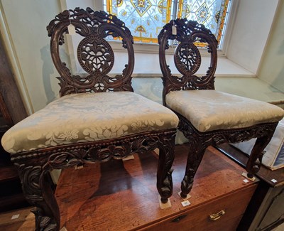 Lot 764 - A pair of Colonial carved and pierced wood...