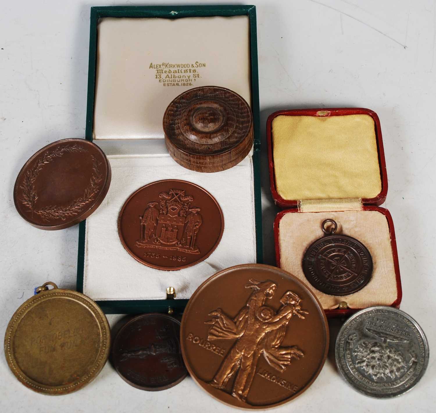 Lot 306 - A white metal commemorative medallion cast...