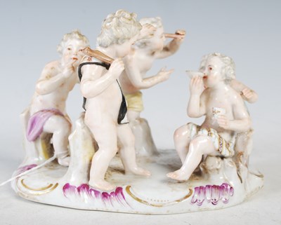 Lot 308 - A Dresden porcelain figure group modelled with...