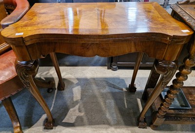 Lot 782 - An early 20th century walnut George III style...