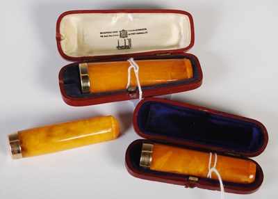 Lot 376 - Alfred Dunhill, a yellow metal mounted amber...