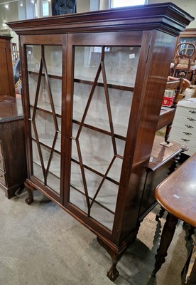 Lot 835 - An early 20th century mahogany astragal glazed...