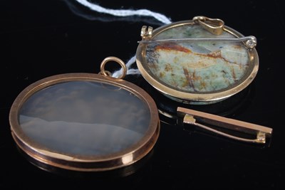 Lot 287 - A yellow metal mounted oval agate brooch with...